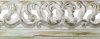 Profil invers�, d�cor sculpt� et ajour�, blanc us� rehauts verts et dor�s 68X34 mm